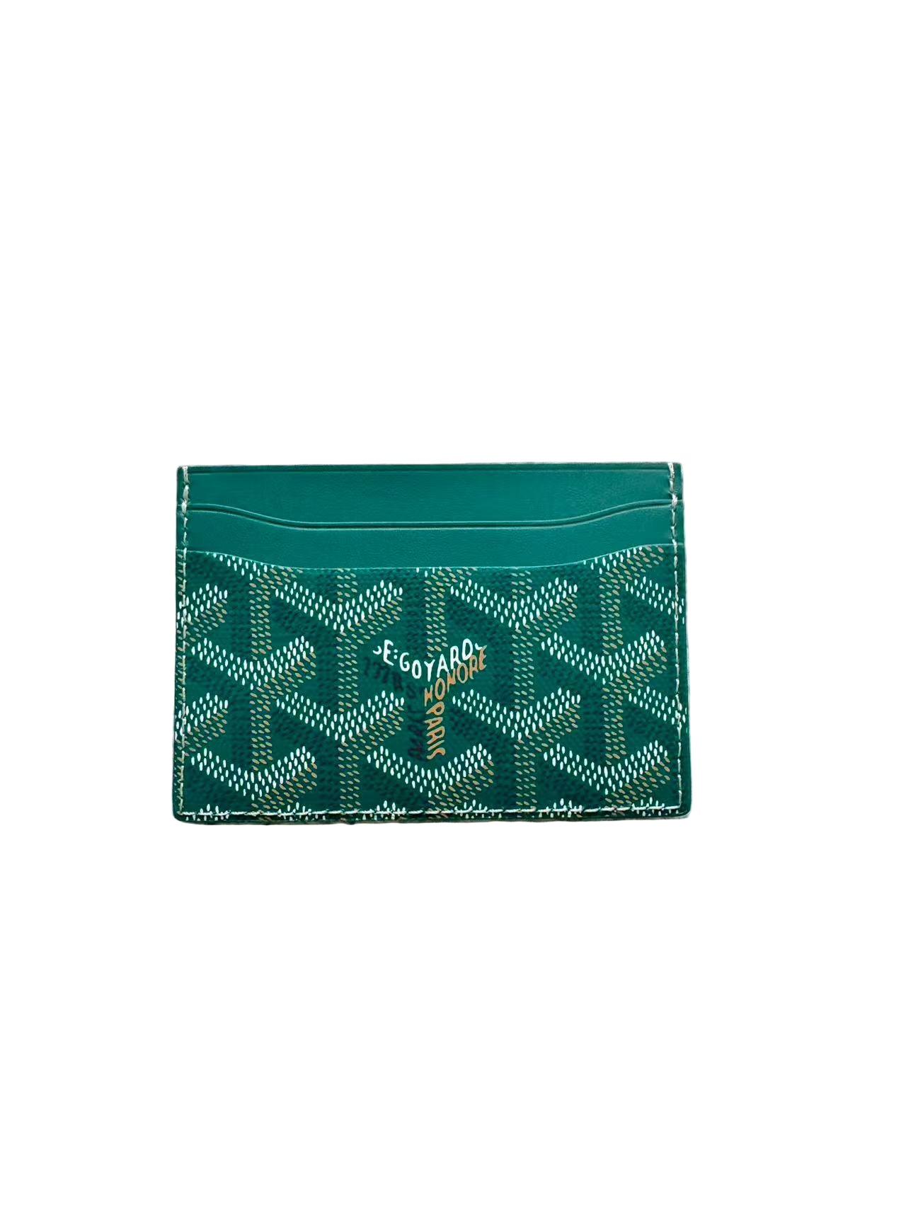 Green cardholder with pattern on a beige carpet