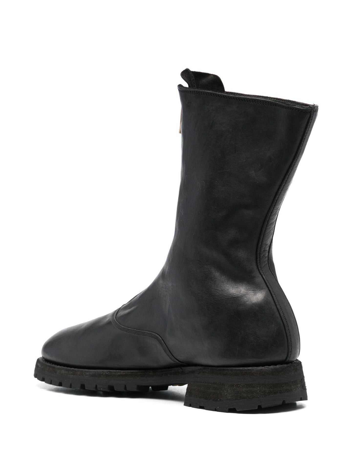 Black leather boot on a white background
