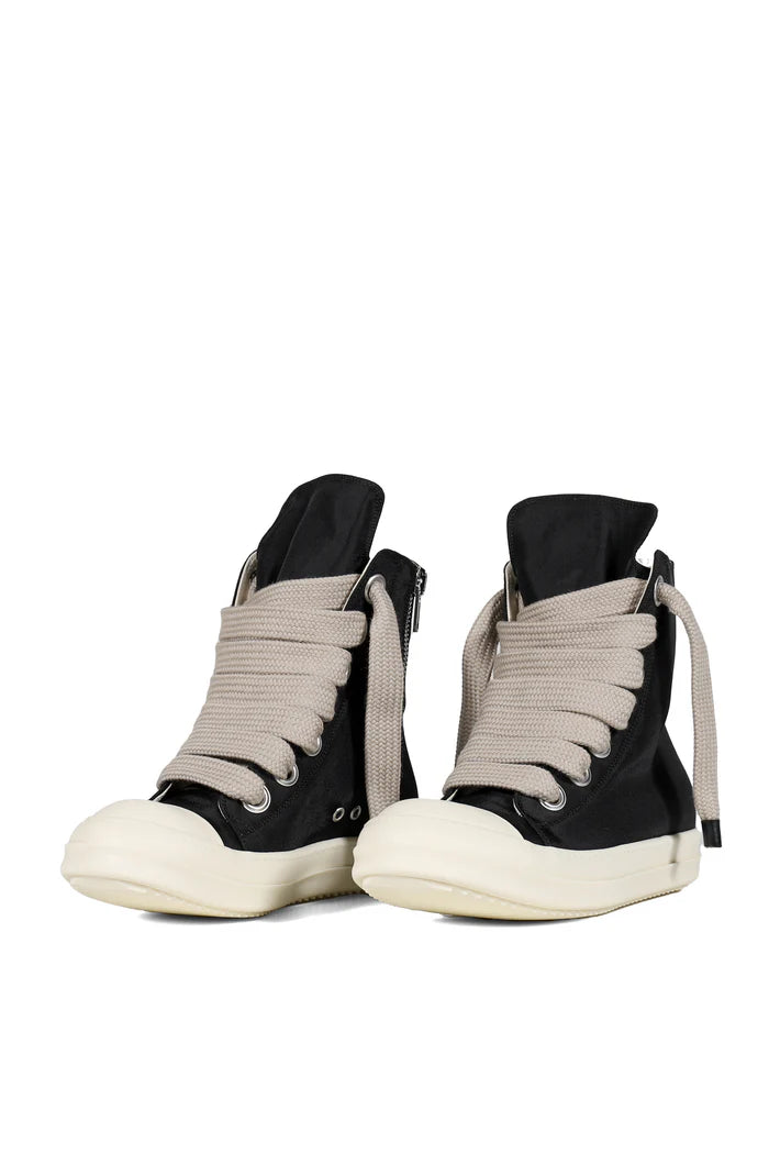 Black and white high-top sneakers on a white background