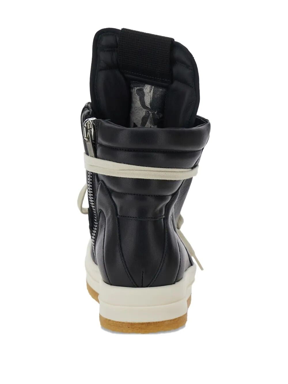 Black and white sneaker with a unique design on a white background