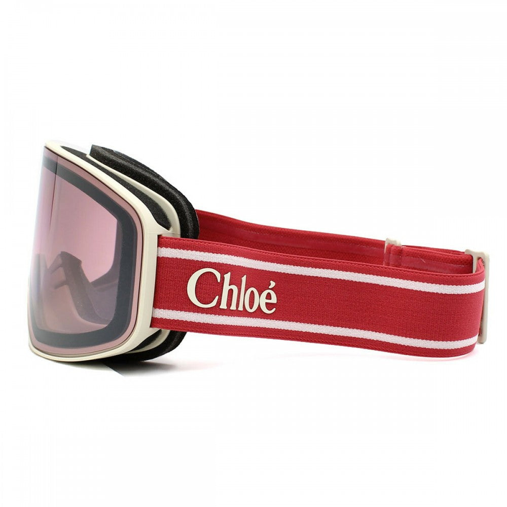 Ski goggles with red and white strap featuring 'Chloe' brand on a white background