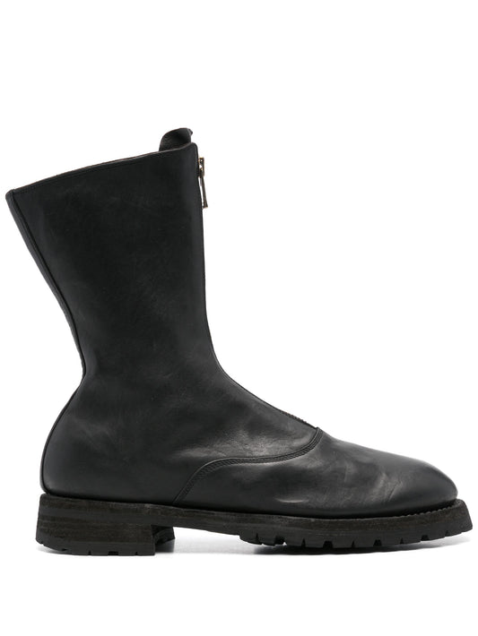 Black leather boot on a white background