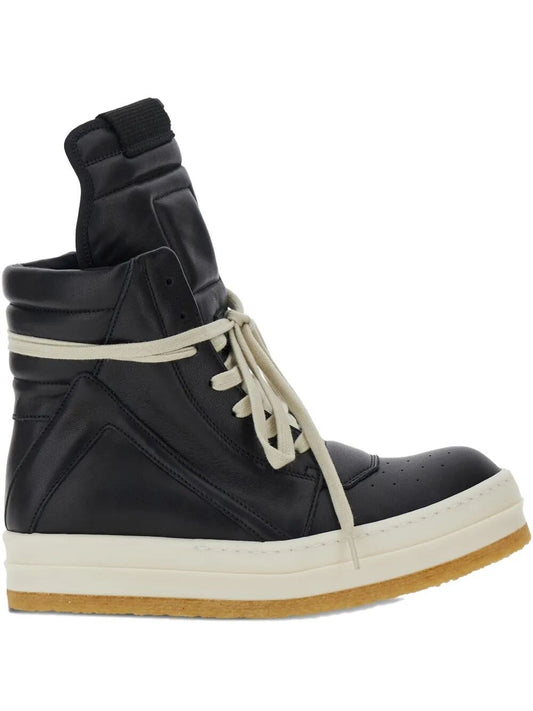 Black high-top sneaker with white laces on a white background